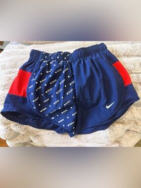 Nike Blue Running Shorts with Red Panels and Star Liner